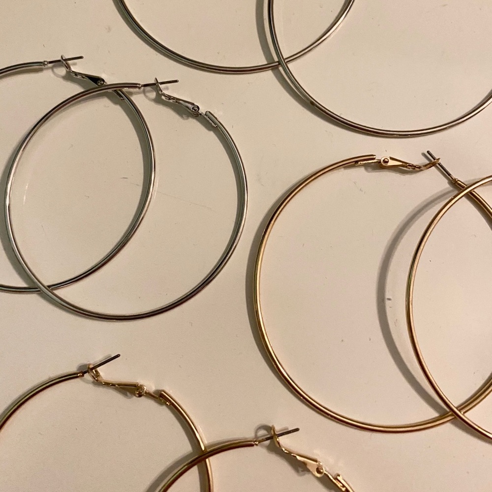 4 pairs of gold and silver hoop earrings